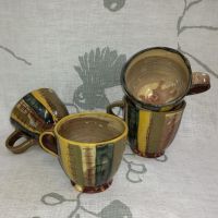 &#039;martinborough hills&#039; cups, terracotta slipware