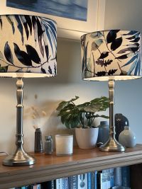 A pair of medium drum table lamps with watermark palm fabric